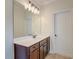 Modern bathroom vanity with dark wood cabinets at 106 Aviary Ct, Summerville, SC 29483