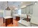 Modern kitchen with granite countertops, stainless steel appliances, and hardwood floors at 106 Aviary Ct, Summerville, SC 29483