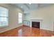Living room with hardwood floors, fireplace, and built-in cabinetry at 106 Aviary Ct, Summerville, SC 29483