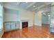Elegant dining area with hardwood floors and a built-in fireplace at 106 Aviary Ct, Summerville, SC 29483