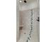 Walk-in shower with tiled walls and built-in seat at 106 Aviary Ct, Summerville, SC 29483