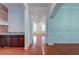 Bright hallway connecting kitchen and dining areas at 106 Aviary Ct, Summerville, SC 29483