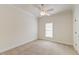 Charming bedroom with ceiling fan and neutral colored carpet at 106 Aviary Ct, Summerville, SC 29483