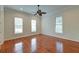 Bright bedroom with hardwood floors and ceiling fan at 106 Aviary Ct, Summerville, SC 29483