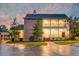 Two-story brick home with front porch and driveway at 106 Aviary Ct, Summerville, SC 29483