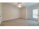 Bright bedroom with neutral walls and carpet at 106 Aviary Ct, Summerville, SC 29483