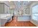 Modern kitchen with hardwood floors, granite counters, and stainless steel appliances at 106 Aviary Ct, Summerville, SC 29483