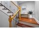 Stairs with wooden handrail and iron spindles at 147 Madison Brooke Ln, Summerville, SC 29486