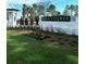 Welcoming entrance to Wando Village with landscaping and signage at 368 Blowing Fresh Dr, Charleston, SC 29492