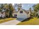 House exterior showcasing a large yard and attached garage at 153 Penzance Blvd, Goose Creek, SC 29445