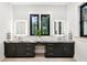 Bathroom with a double vanity, marble countertop, and large mirrors at 4028 Gnarled Oaks Ln, Johns Island, SC 29455