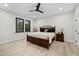 Spacious bedroom with wooden bed frame and light flooring at 4028 Gnarled Oaks Ln, Johns Island, SC 29455