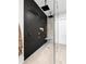 Elegant bathroom with a frameless glass shower, and dark tile at 4028 Gnarled Oaks Ln, Johns Island, SC 29455