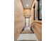 Stairs leading down to the basement with wood wall paneling at 4028 Gnarled Oaks Ln, Johns Island, SC 29455