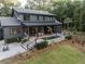 An expansive backyard features a large deck, an inground pool, and a relaxing patio area at 4028 Gnarled Oaks Ln, Johns Island, SC 29455