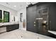 Spa-like bathroom with a large walk-in shower, double vanity, and modern fixtures at 4028 Gnarled Oaks Ln, Johns Island, SC 29455