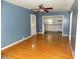 Dining room with hardwood floors and view into kitchen at 3034 Maybank Hwy, Johns Island, SC 29455