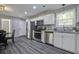 Modern kitchen with stainless steel appliances and grey flooring at 318 Bedford Rd, Cross, SC 29436