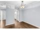 Simple dining room with light walls and wood floors at 2757 Jobee Dr # 1106, Charleston, SC 29414