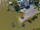 Aerial view of a small boat launch and parking area by the water at 1802 Wood Duck Rd, Moncks Corner, SC 29461