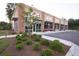 Modern commercial building with brick exterior, ample parking, and landscaping at 337 Hillman Trail Dr, Moncks Corner, SC 29461