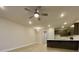 Open concept living room with kitchen island, and ceiling fan at 345 Bremerton Dr, Goose Creek, SC 29445