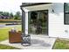 Private patio with wicker chair and patterned rug at 345 Bremerton Dr, Goose Creek, SC 29445