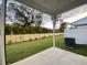 Covered patio with backyard view, wooden fence, and grassy area at 345 Bremerton Dr, Goose Creek, SC 29445