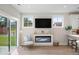 Living room with fireplace, sliding glass doors, and comfortable seating at 345 Bremerton Dr, Goose Creek, SC 29445