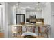 Modern kitchen with white cabinets, granite countertops, and stainless steel appliances at 1665 A Marsh Harbor Ln, Mount Pleasant, SC 29464
