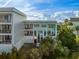 Exterior view of waterfront home with lush landscaping at 1665 A Marsh Harbor Ln, Mount Pleasant, SC 29464