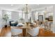 Open concept dining area, hardwood floors, kitchen and living room visible at 1665 A Marsh Harbor Ln, Mount Pleasant, SC 29464