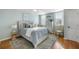 Bright bedroom with hardwood floors and neutral decor at 1665 A Marsh Harbor Ln, Mount Pleasant, SC 29464