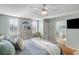 Main bedroom with ensuite bathroom and hardwood floors at 1665 A Marsh Harbor Ln, Mount Pleasant, SC 29464