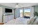 Main bedroom with water views and king bed at 1665 A Marsh Harbor Ln, Mount Pleasant, SC 29464