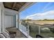 Balcony with marsh views and seating area at 1665 A Marsh Harbor Ln, Mount Pleasant, SC 29464