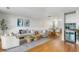 Open concept living room with hardwood floors and comfortable seating at 1665 A Marsh Harbor Ln, Mount Pleasant, SC 29464