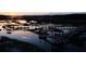 Sunset view of serene waterfront with two wooden docks and gazebos at 3885 Summerton St, Mount Pleasant, SC 29466