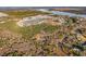 Aerial view of a community with wooded areas and new homes at 3885 Summerton St, Mount Pleasant, SC 29466