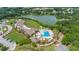Community clubhouse with pool, playground, and lake views at 1111 Summerwind Lane, Seabrook Island, SC 29455