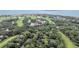 Aerial view of coastal community with golf course and ocean views at 1111 Summerwind Lane, Seabrook Island, SC 29455