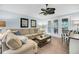 Cozy living room featuring comfortable seating, a coffee table, and access to a screened porch at 1111 Summerwind Lane, Seabrook Island, SC 29455