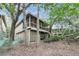 Charming elevated home nestled in lush, tree-filled surroundings at 1111 Summerwind Lane, Seabrook Island, SC 29455