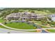 Resort clubhouse with lush landscaping and large parking area at 1111 Summerwind Lane, Seabrook Island, SC 29455