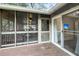 Spacious screened porch with access to the back yard and inside at 1111 Summerwind Lane, Seabrook Island, SC 29455