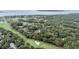 Aerial view of a residential area integrated with a golf course at 1111 Summerwind Lane, Seabrook Island, SC 29455