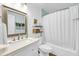 Charming bathroom with a bathtub, shower, and updated vanity at 1111 Summerwind Lane, Seabrook Island, SC 29455