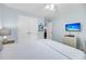 Bright bedroom with a comfortable queen-size bed and flat-screen TV at 1111 Summerwind Lane, Seabrook Island, SC 29455