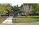 Brick ranch home with fenced yard and driveway at 101 Robin Ct, Summerville, SC 29485