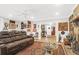 Spacious living room with hardwood floors, comfortable seating, and a fireplace at 925 Center St, Mount Pleasant, SC 29464